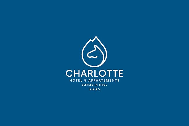 Logo of Charlotte Hotel & Appartements with a water drop and mountain design.